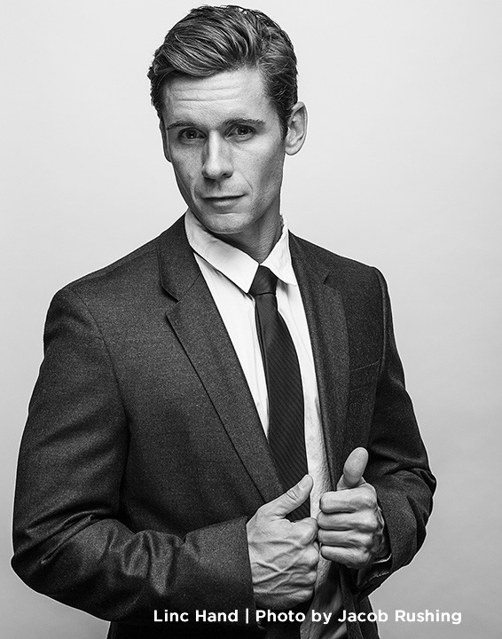 Photo of actor, Linc Hand, in suit